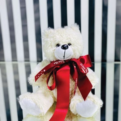 Urso com fita